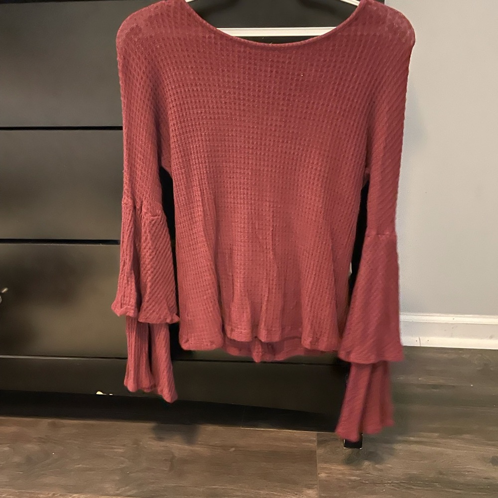 Tight dark red sweater